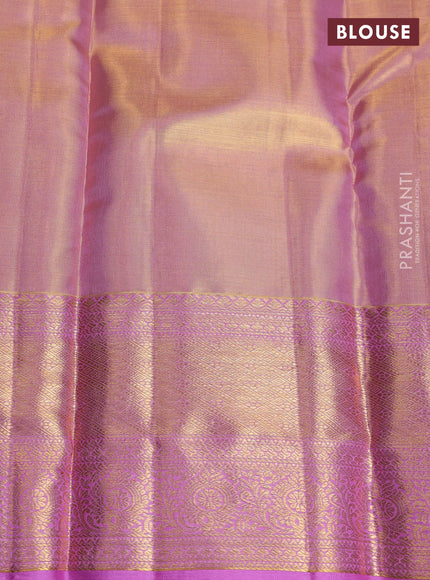 Pure kanchipuram tissue silk saree dual shade of lotus pink and mild lavender with allover silver zari woven brocade weaves and rich zari woven border