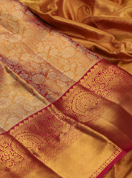 Pure kanchipuram tissue silk saree gold and maroon with allover zari woven brocade weaves and rich zari woven border