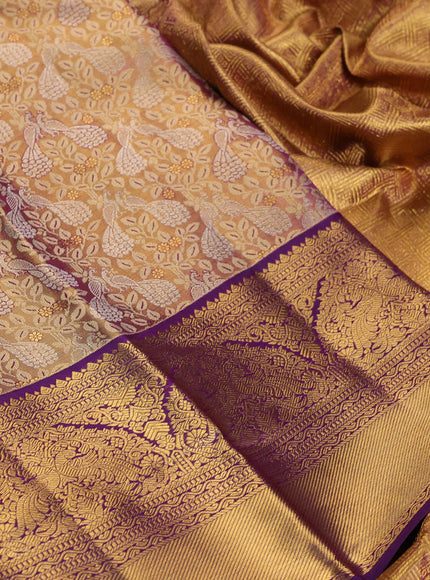 Pure kanchipuram tissue silk saree dual shade of gold and purple with allover zari woven brocade weaves and long rich zari woven border