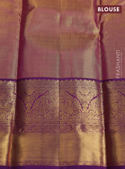 Pure kanchipuram tissue silk saree dual shade of gold and purple with allover zari woven brocade weaves and long rich zari woven border