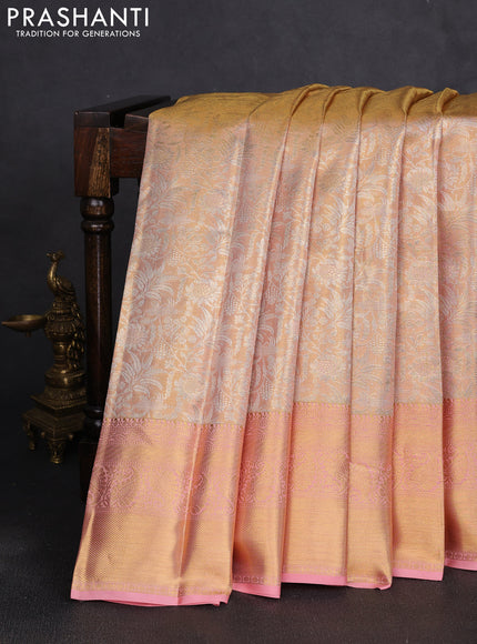 Pure kanchipuram tissue silk saree peach shade and peach with allover zari woven brocade weaves and rich zari woven border