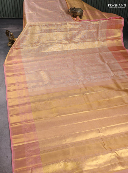 Pure kanchipuram tissue silk saree peach shade and peach with allover zari woven brocade weaves and rich zari woven border
