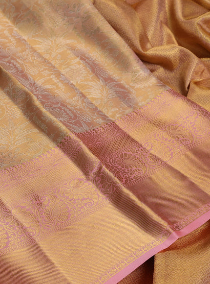 Pure kanchipuram tissue silk saree peach shade and peach with allover zari woven brocade weaves and rich zari woven border