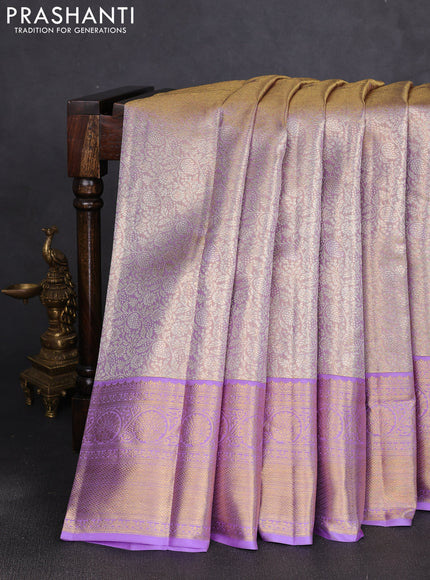 Pure kanchipuram tissue silk saree mild lavender and lavender with allover zari woven brocade weaves and rich zari woven border