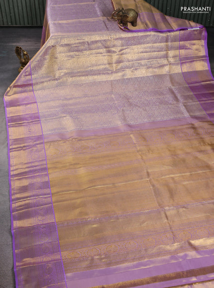 Pure kanchipuram tissue silk saree mild lavender and lavender with allover zari woven brocade weaves and rich zari woven border
