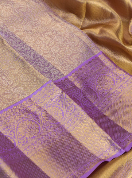 Pure kanchipuram tissue silk saree mild lavender and lavender with allover zari woven brocade weaves and rich zari woven border