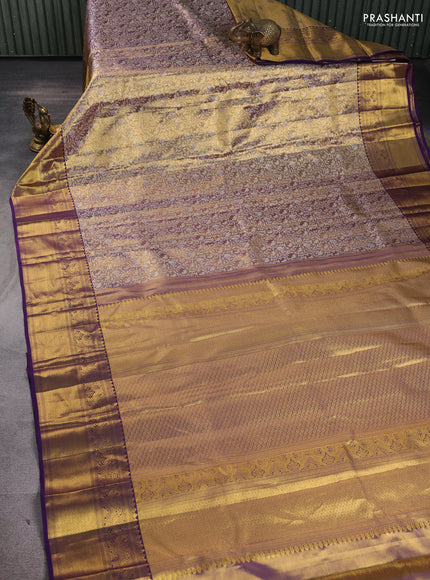 Pure kanchipuram tissue silk saree gold and purple with allover zari woven brocade weaves and rich zari woven border
