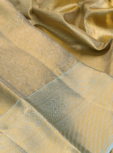 Pure kanchipuram tissue silk saree gold and mild teal blue with allover zari woven brocade weaves and rich zari woven border