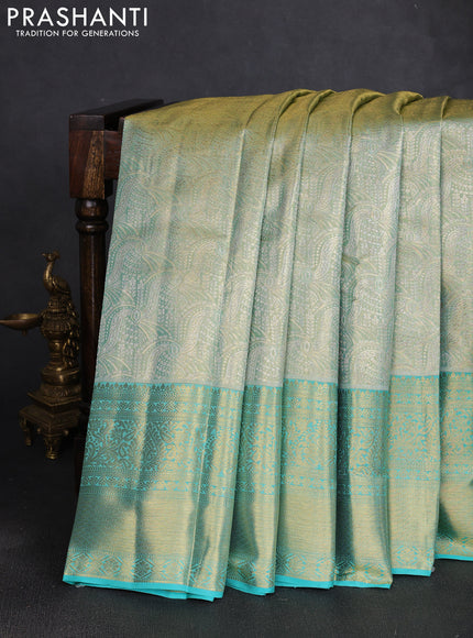 Pure kanchipuram tissue silk saree golden teal and teal blue with allover zari woven brocade weaves and rich zari woven border