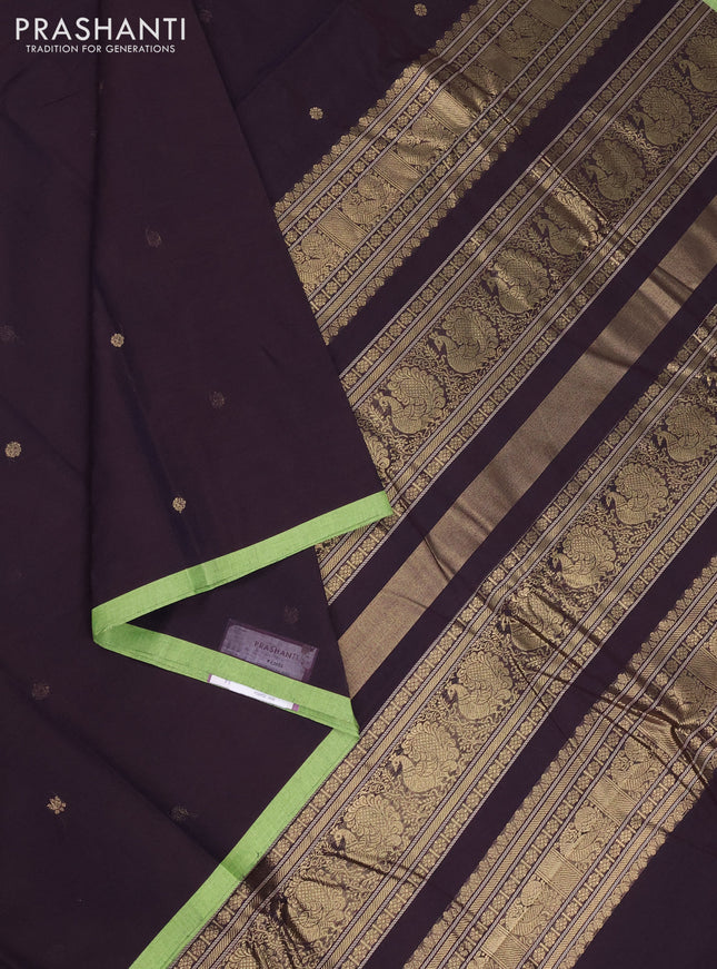 Kanchi cotton saree deep jamun shade and light green with zari woven buttas and piping border