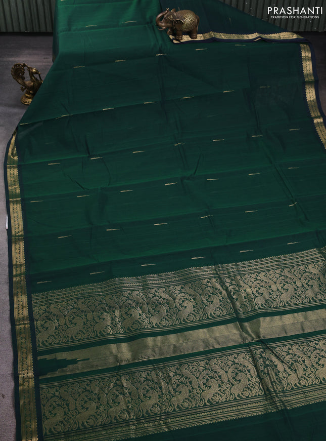 Kanchi cotton saree bottle green with zari woven buttas and zari woven border