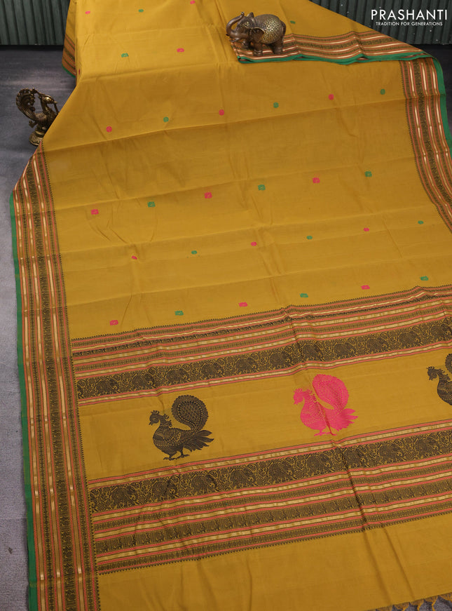 Kanchi cotton saree dark mustard and green with thread woven buttas and thread & zari woven border
