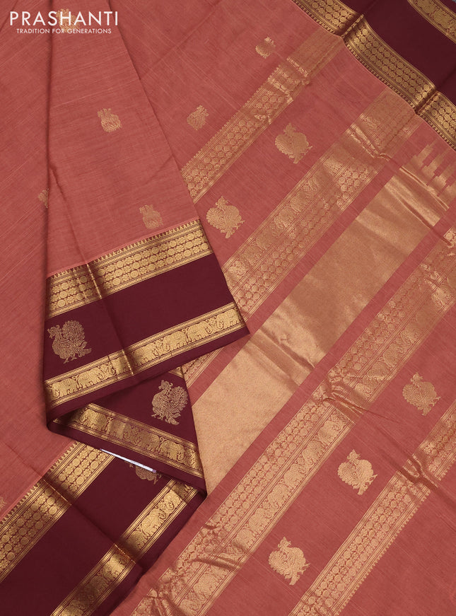Kanchi cotton saree rust shade and deep maroon with plain body and rettapet zari woven border
