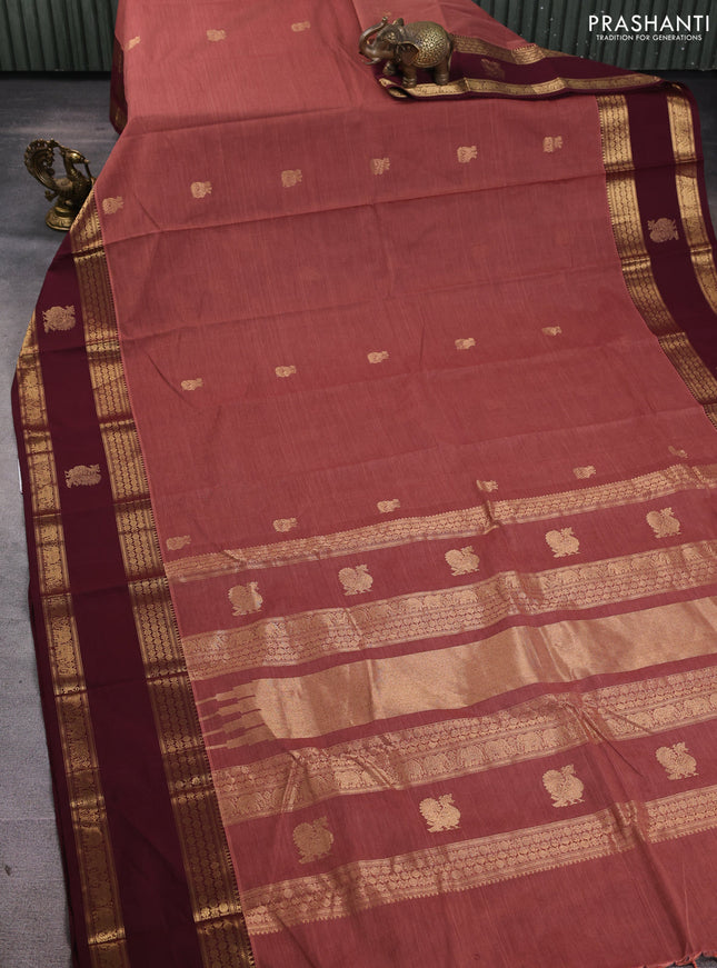 Kanchi cotton saree rust shade and deep maroon with plain body and rettapet zari woven border