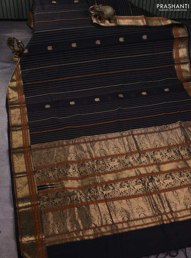 Kanchi cotton saree black with allover zari stripes & buttas and zari woven border