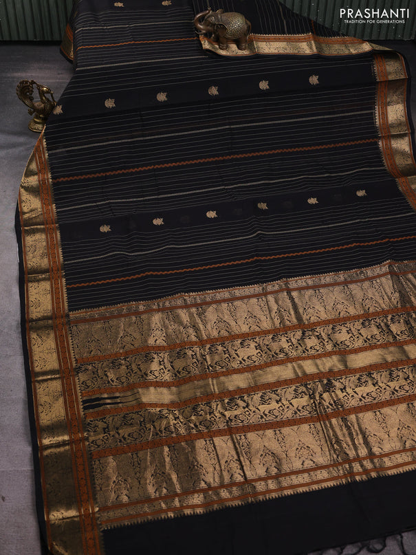 Kanchi cotton saree black with allover zari stripes & buttas and zari woven border