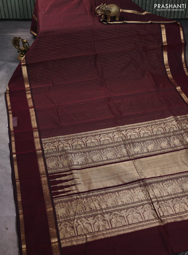 Kanchi cotton saree deep maroon with allover zari strip pattern and rettapet zari woven border