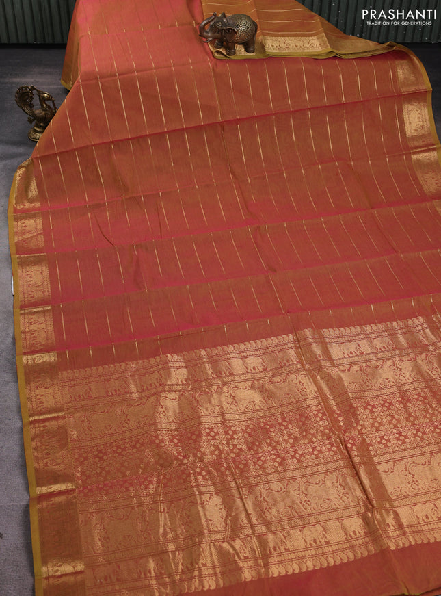 Kanchi cotton saree dual shade of pinkish mustard with allover zari stripe pattern and elephant zari woven border