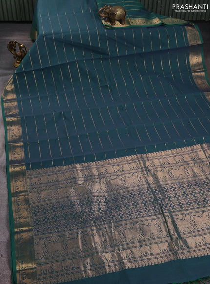 Kanchi cotton saree dual shade of bluish green with allover zari weaves and zari woven border