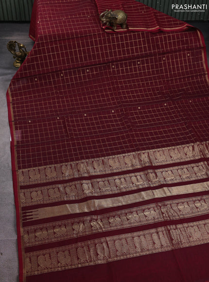 Kanchi cotton saree maroon with allover zari checks & buttas and zari piping border