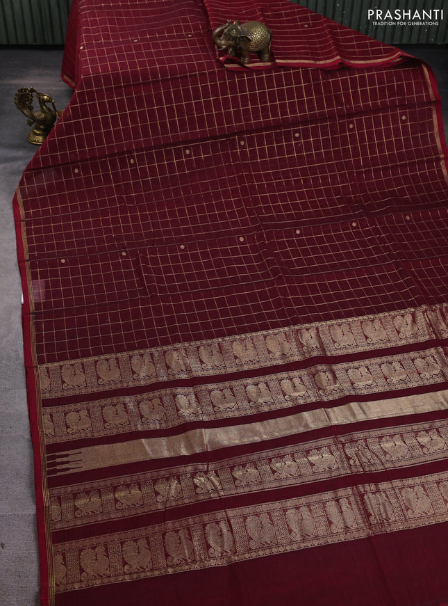 Kanchi cotton saree maroon with allover zari checks & buttas and zari piping border