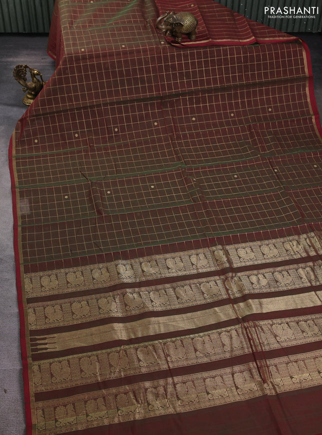Kanchi cotton saree dual shade of greenish maroon and maroon with allover zari checks & buttas and zari woven piping border