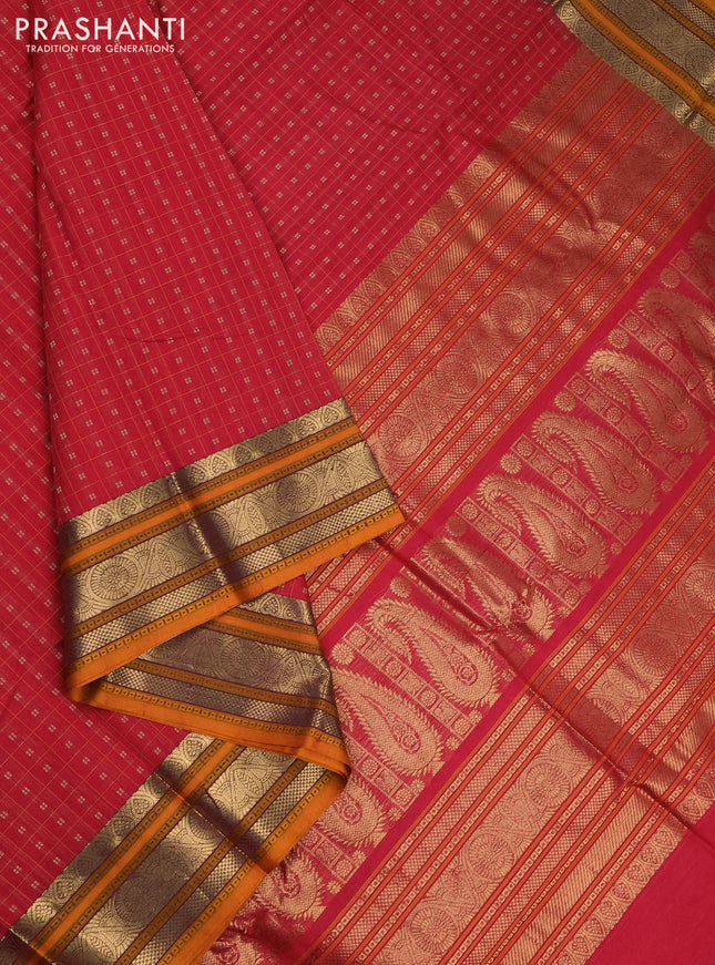 Kanchi cotton saree pink and dark mustard with allover lakshadeepam pattern and zari woven border