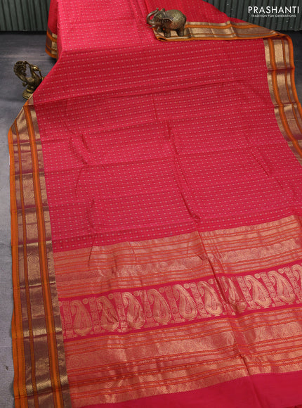 Kanchi cotton saree pink and dark mustard with allover lakshadeepam pattern and zari woven border