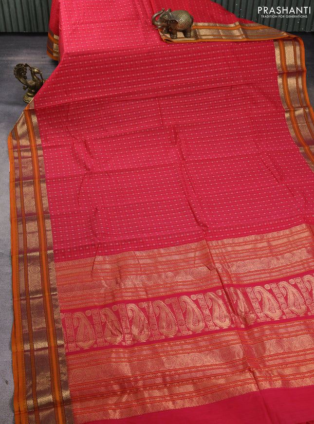 Kanchi cotton saree pink and dark mustard with allover lakshadeepam pattern and zari woven border