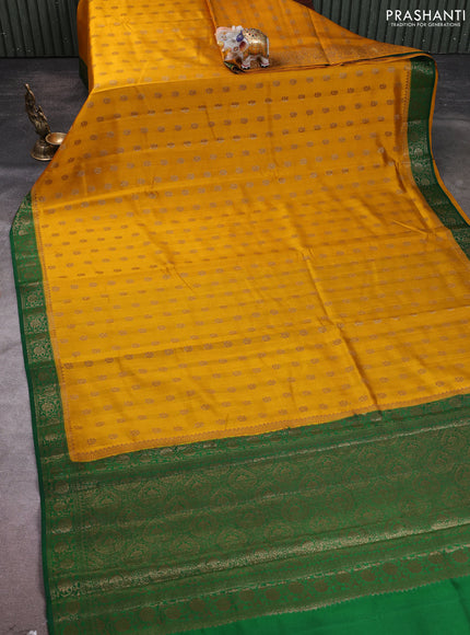 Chiniya silk saree mustard yellow and green with allover thread & zari woven buttas and woven border