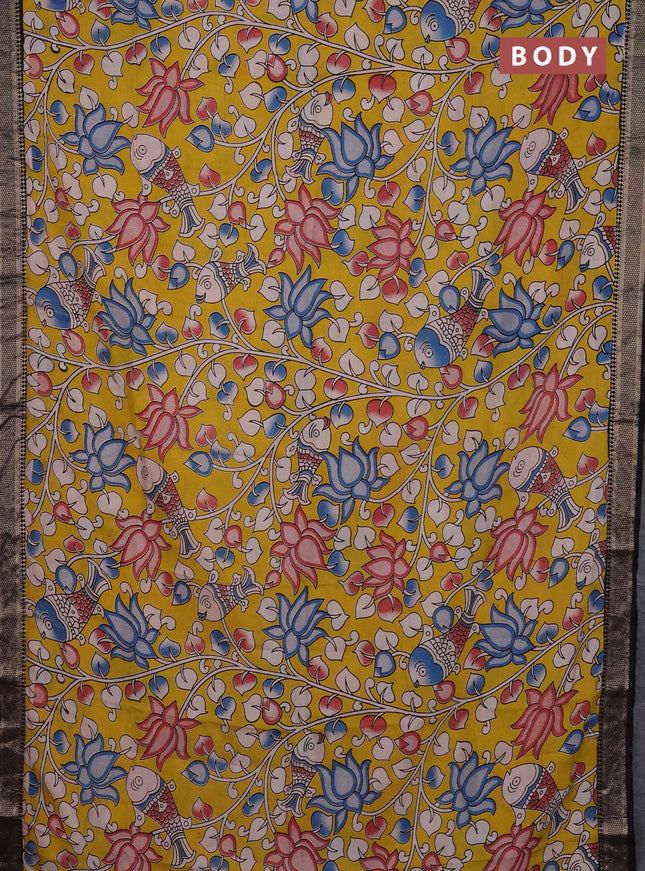 Kalamkari semi silk saree yellow and black with allover prints and mangalgiri border