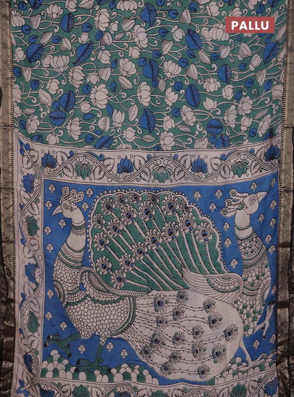 Kalamkari semi silk saree pastel green and black with allover prints and mangalgiri border