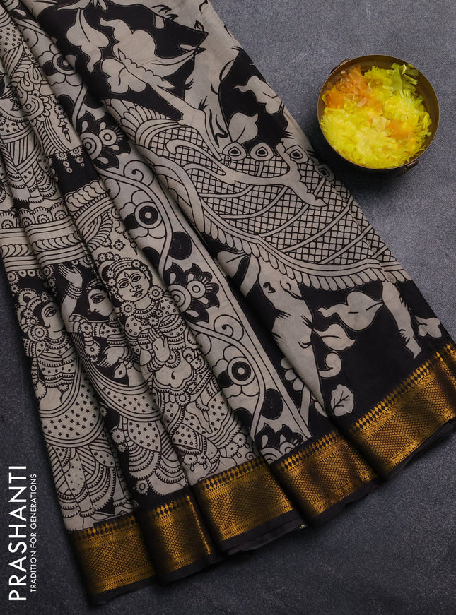 Kalamkari semi silk saree black and jamun shade with allover prints and mangalgiri border