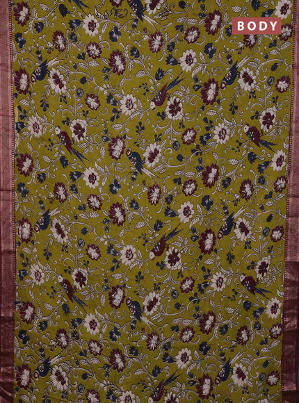 Kalamkari semi silk saree light green and wine shade with allover prints and mangalgiri border