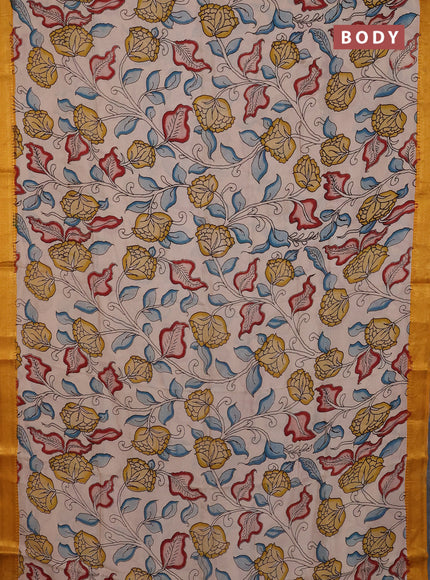 Kalamkari semi silk saree beige and mustard yellow with allover prints and mangalgiri border