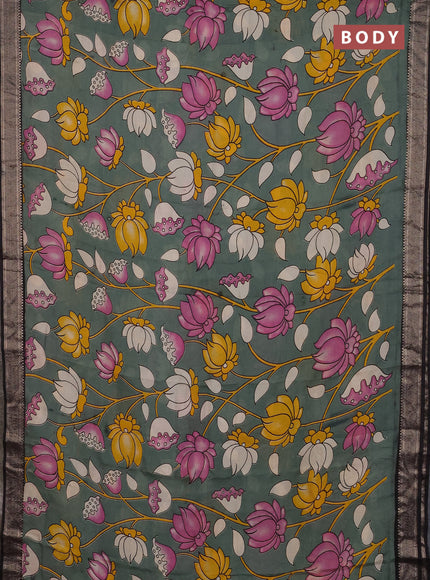 Kalamkari semi silk saree pastel green and black with allover prints and mangalgiri border