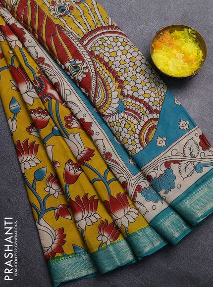 Kalamkari semi silk saree mustard yellow and teal green with allover prints and mangalgiri border