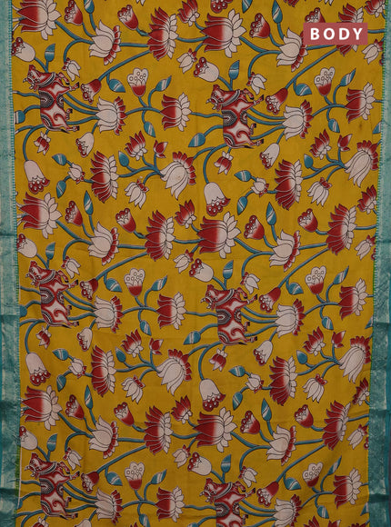 Kalamkari semi silk saree mustard yellow and teal green with allover prints and mangalgiri border