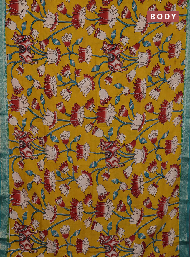 Kalamkari semi silk saree mustard yellow and teal green with allover prints and mangalgiri border