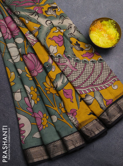 Kalamkari semi silk saree pastel green and black with allover prints and mangalgiri border