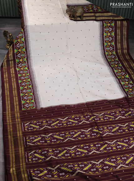 Pochampally silk saree off white and coffee brown with allover thread woven buttas and temple design ikat zari woven boder