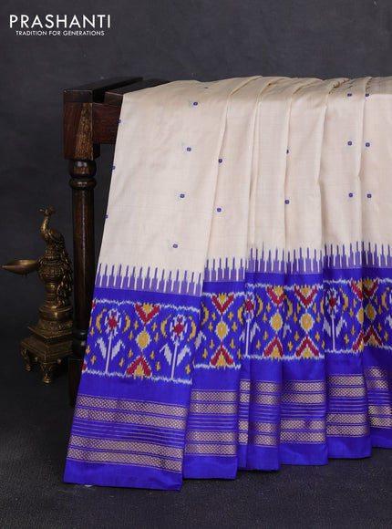 Pochampally silk saree off white and royal blue with allover thread woven buttas and temple design ikat zari woven boder