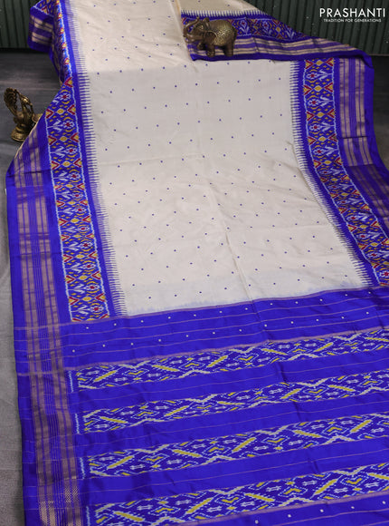 Pochampally silk saree off white and royal blue with allover thread woven buttas and temple design ikat zari woven boder