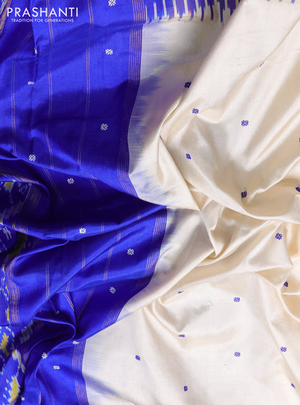 Pochampally silk saree off white and royal blue with allover thread woven buttas and temple design ikat zari woven boder
