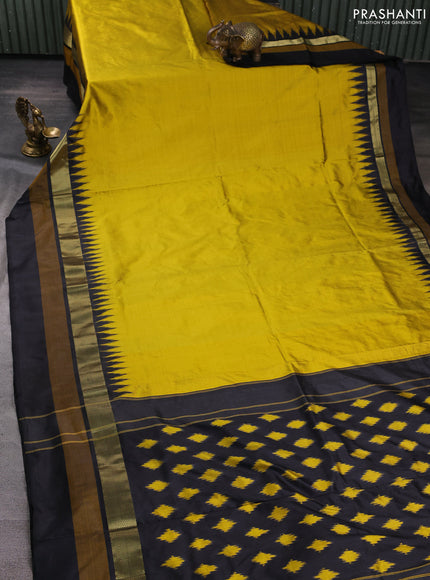 Pochampally silk saree dark mustard and black with plain body and temple design zari woven simple border