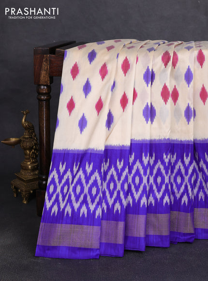 Pochampally silk saree off white and royal blue with allover ikat woven buttas and ikat zari woven border