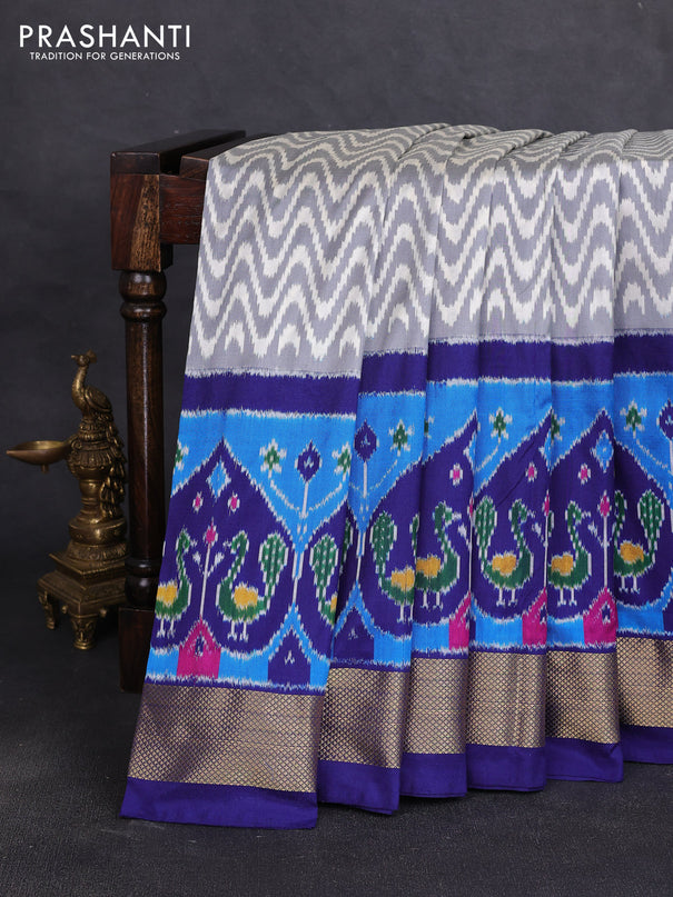 Pochampally silk saree grey and royal blue with allover ikat zigzag pattern and long ikat zari woven border