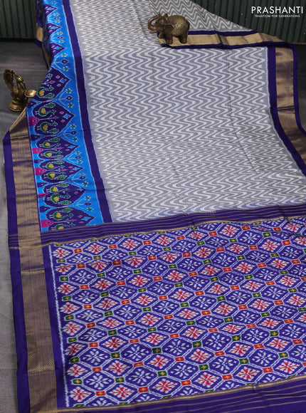 Pochampally silk saree grey and royal blue with allover ikat zigzag pattern and long ikat zari woven border