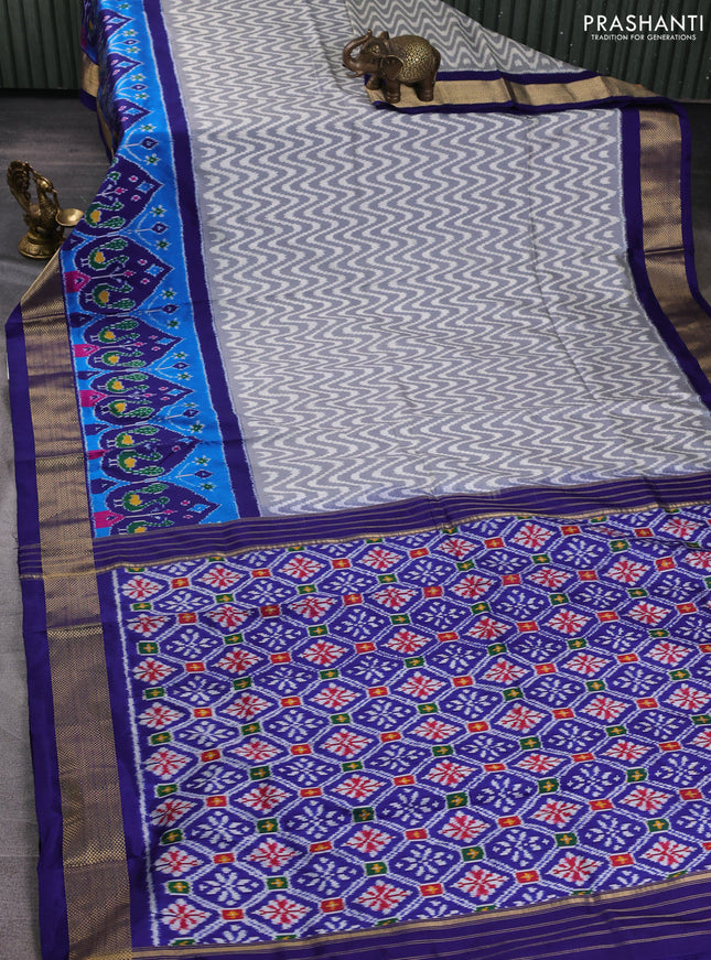 Pochampally silk saree grey and royal blue with allover ikat zigzag pattern and long ikat zari woven border