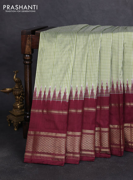 Pochampally silk saree light green and deep wine with allover thread small checked pattern and long rettapet zari woven border